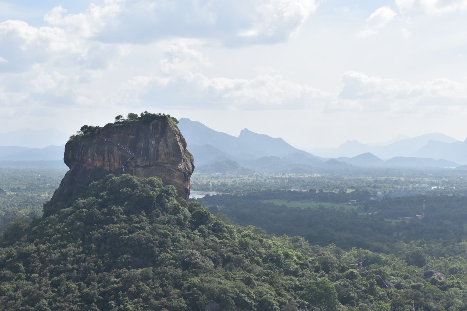 The rock fortress of Sigiriya rising from the plain in Sri Lanka
